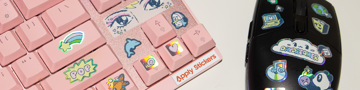 Apply stickers on a pink keyboard and black computer mouse